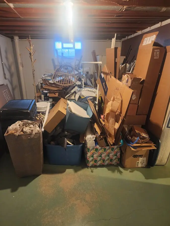 Roll-off dumpster container at job site for Yard Waste Dumpster Rental in De Witt